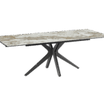 Table de repas rectangulaire INFLUENCE extensible. Plateau effet Marbre Calacatta (blanc pur veiné de gris) prestigieux. Piètement central sculptural (design étoile/X) en métal foncé. Meuble design luxe, lumineux et dynamique L'Arche du Bois.
